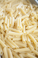 Cooked penne on tray,close up