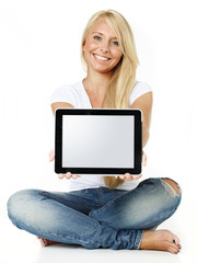 Woman presenting her tablet pc with copyspace