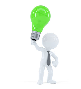 Businessman with green light bulb. Concept of creative business