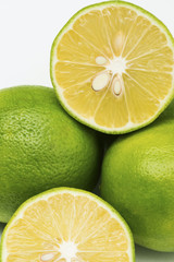 Fresh limes on white background