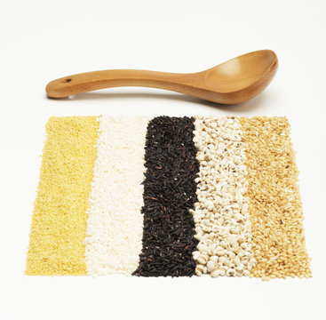 mixed rices and wooden tablespoon