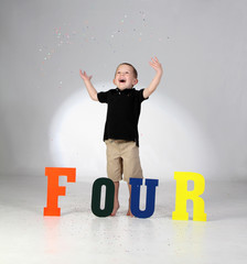 A Four Year Old Boy Celebrates His Birthday