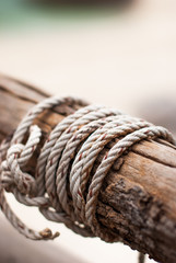 ropes tied to wooden pole