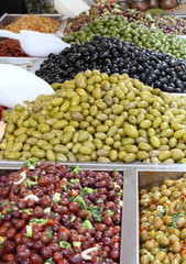 tasty olives for sale at vegetable market directly from producer