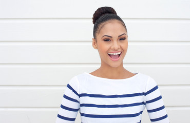 Portrait of a happy young woman laughing