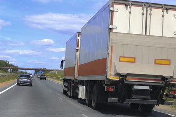 Naklejka premium truck moves on highway