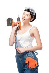 cheerful female worker holding drill - 56717031