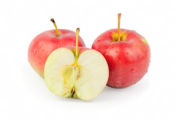 three fresh red apples. Isolated on white background. Close-up