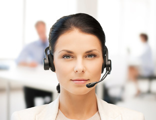 female helpline operator with headphones