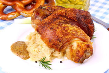 Grilled pork with pickled cabbage, sweet mustard, pretzels