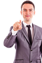 Portrait of a young businessman pointing with his finger