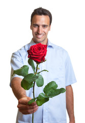 Latin lover with a red rose