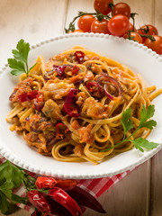 pasta with fish ragout and hot chili pepper