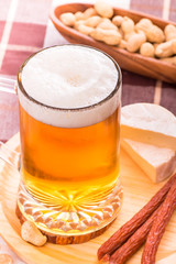 Beer with various snacks