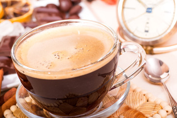 Coffee cup and clock