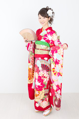 Naklejka premium Beautiful asian kimono woman on white background