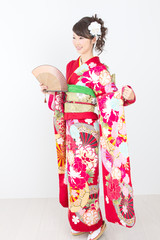 Fototapeta premium Beautiful asian kimono woman on white background