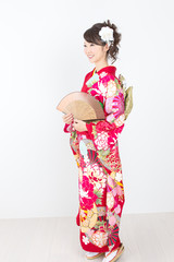 Fototapeta premium Beautiful asian kimono woman on white background