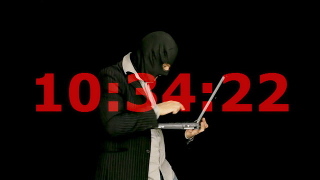 Masked criminal laptop cybercrime countdown