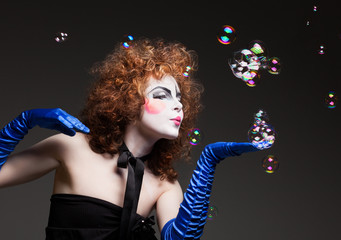 woman mime with soap bubbles.