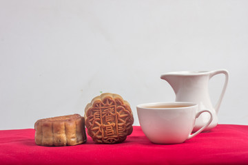 chinese mooncake on red velvet