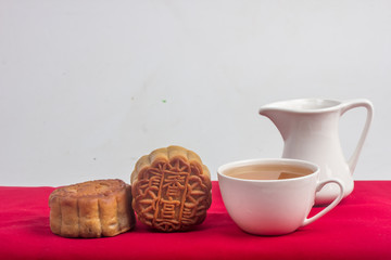 chinese mooncake on red velvet