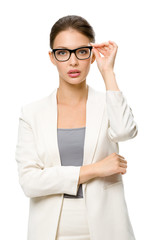 Half-length portrait of businesswoman wearing glasses