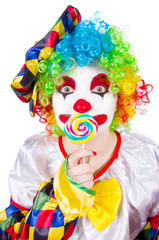Clown with lollipops isolated on white