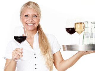Pretty lady waitress with glasses of wine