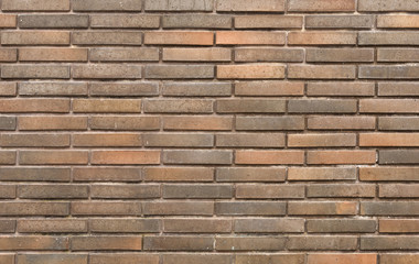 Background of new brick wall in dark tones