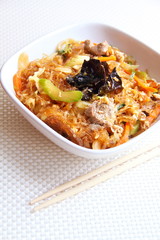 Spicy glass noodles with beef, vegetables and eggs
