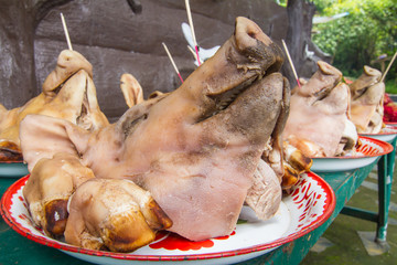 Boiled pig head for sacrifice and vow