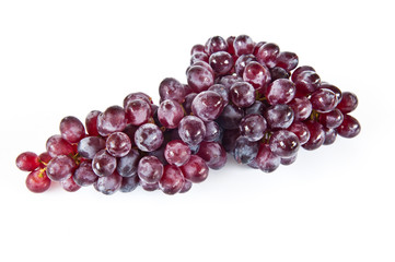 bunch of red grapes on white