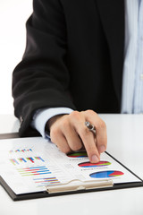 Businessman showing financial report