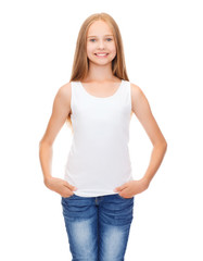Fototapeta premium smiling teenage girl in blank white shirt
