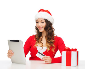 woman with gift, tablet pc and credit card