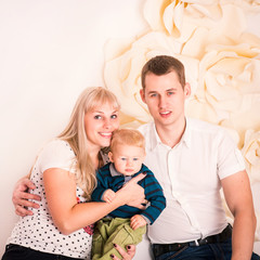 Portrait of a happy family with baby