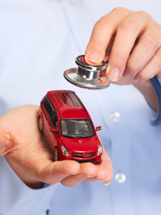 Hand with car.