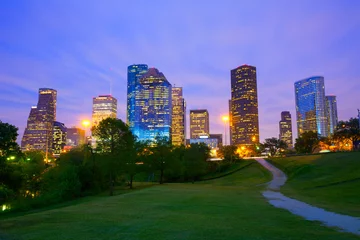 Fotobehang Houston Texas modern skyline at sunset twilight from park © lunamarina