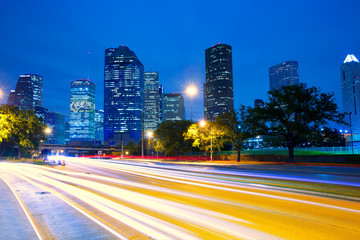 Houston Texas skyline at sunset with traffic lights