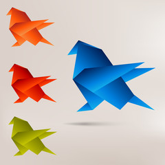 Fototapeta na wymiar Origami paper bird on abstract background