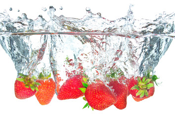 Juicy strawberry and water splash. Healthy and tasty food