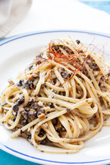 Spaghetti with olives and anchovies