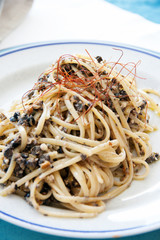 Spaghetti with olives and anchovies
