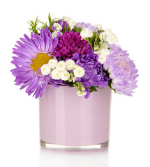 Beautiful bouquet of bright flowers in glass vase, isolated