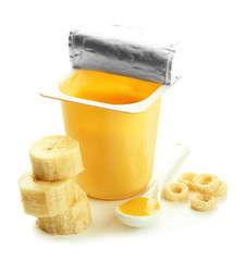 Tasty dessert in open plastic cup and banana, isolated on white