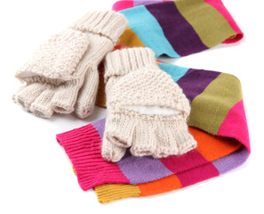 Wool fingerless gloves and multicolor scarf, isolated on white