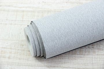 Wallpaper on wooden floor