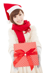 smiling young woman showing christmas gift box