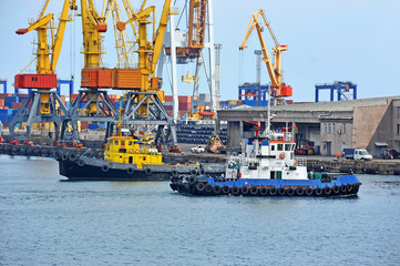 Fototapeta premium Tugboat in harbor quayside on Odessa, Ukraine